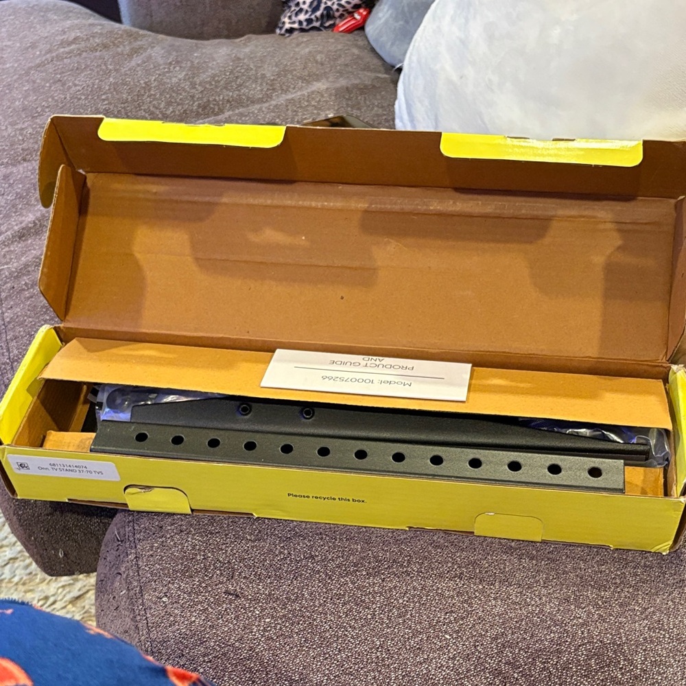 On Running Yellow and Black TV Stand